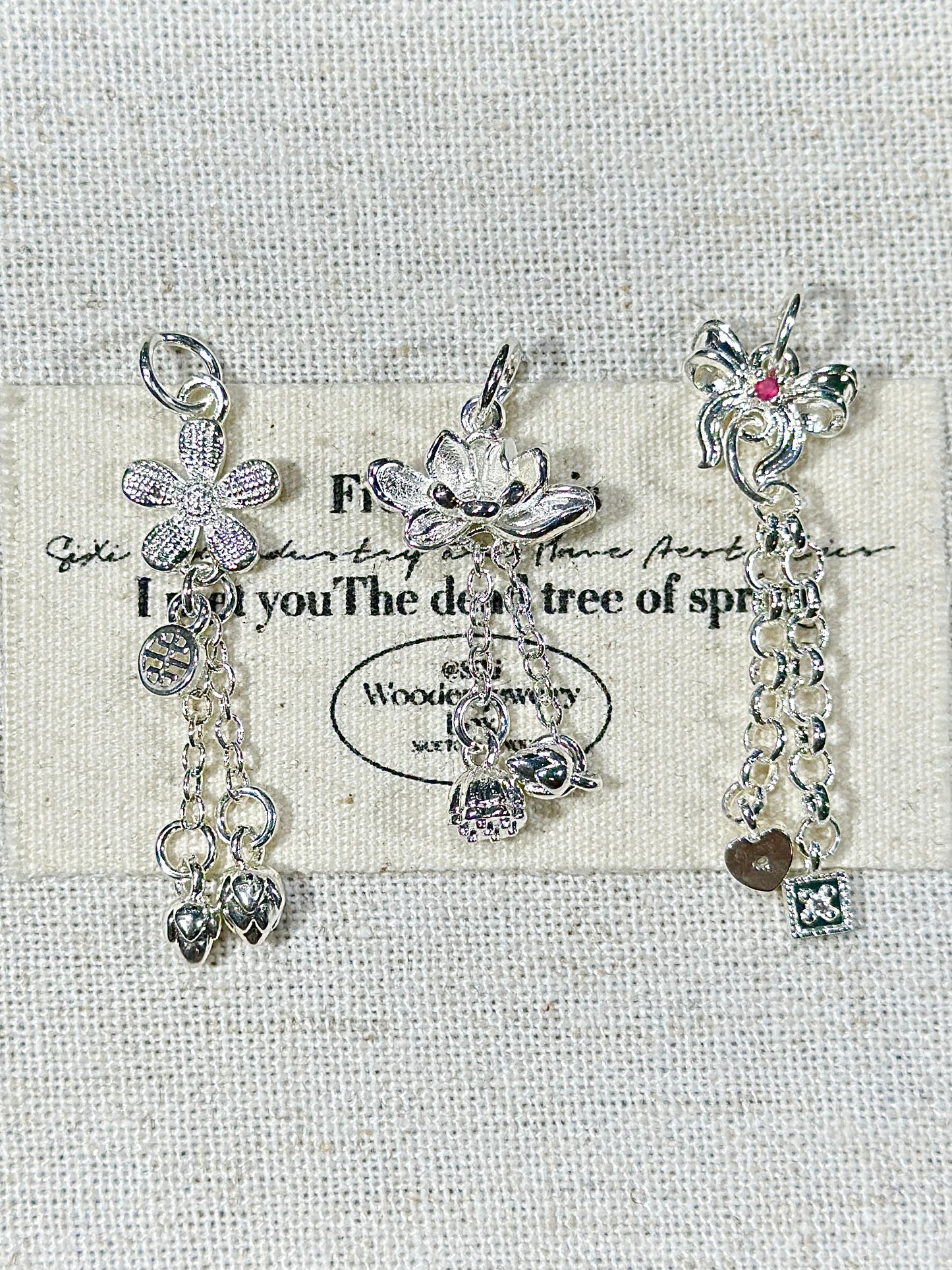 Bright silver tassel drip