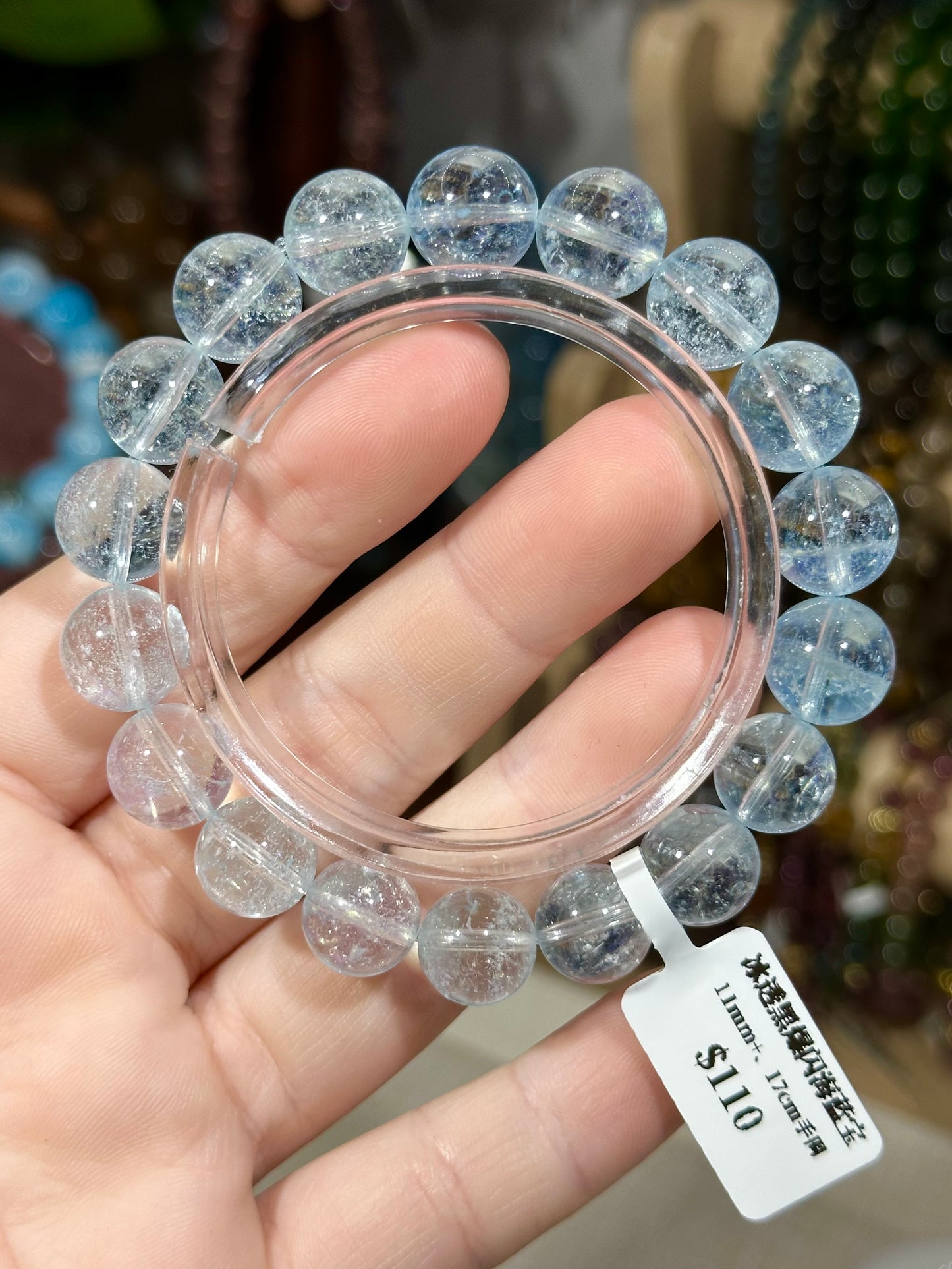 Ice-clear black glittering aquamarine crystal